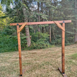 Handmade wood wedding arch.  7’ 5” tall Top board length 6’ 6” Inside dimensions of the width 4’ 6” comes apart for easy transporting.
